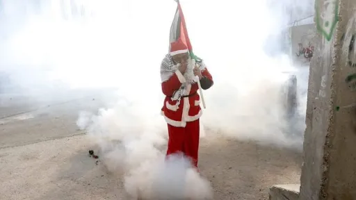 Santa being Teargassed by Israeli forces in Palestine