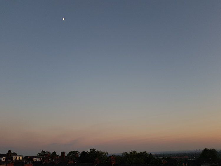 Half moon just before sunset on the 7th of Ramadan