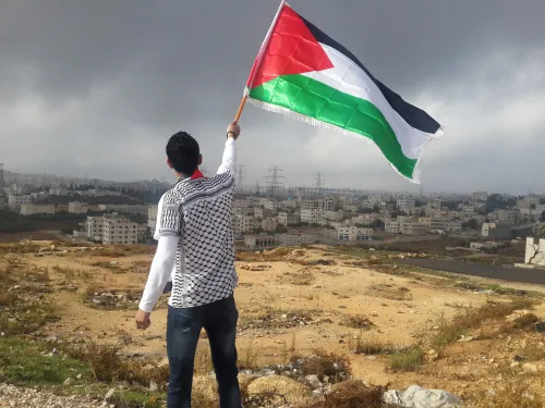 Waving the Palestinian Flag